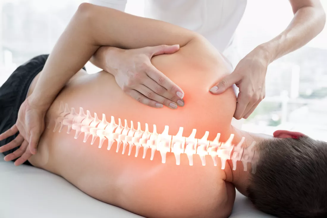 woman-with-back-pain-is-touching-back-her-back